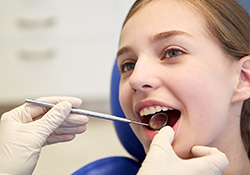 Child receiving dental exam