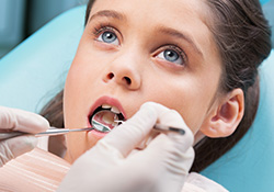 Child receiving dental care