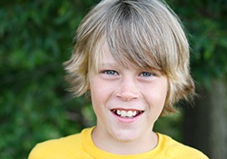 Young boy with healthy smile