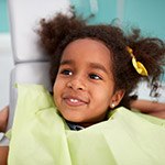 Smiling little girl in dental chair