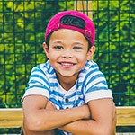 Smiling little boy outdoors