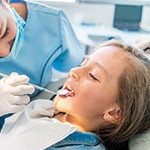 Relaxed child in dental chair